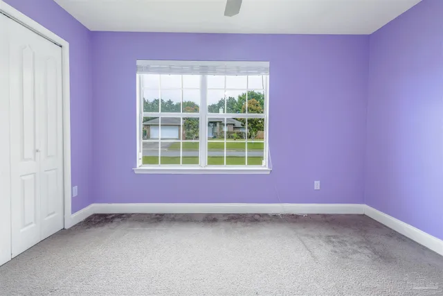 an empty room with windows