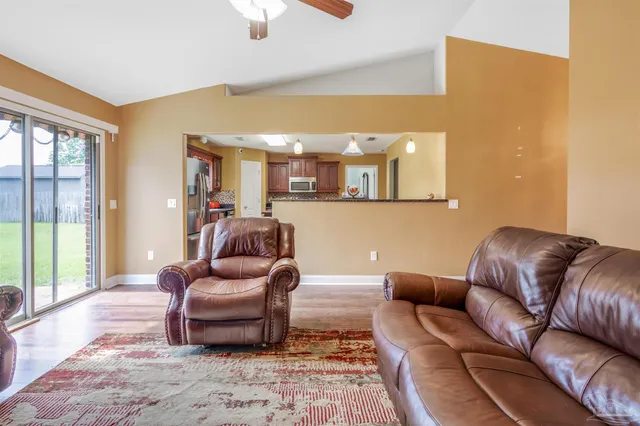 a kitchen with stainless steel appliances granite countertop a stove and a sink