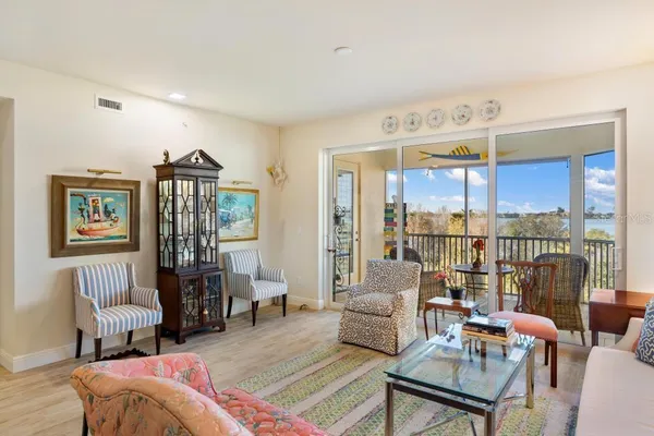 a view of living room with granite countertop furniture and window