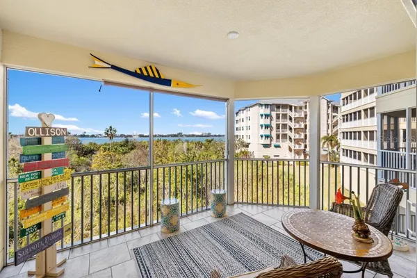 a bathroom with a toilet a sink and a shower curtain