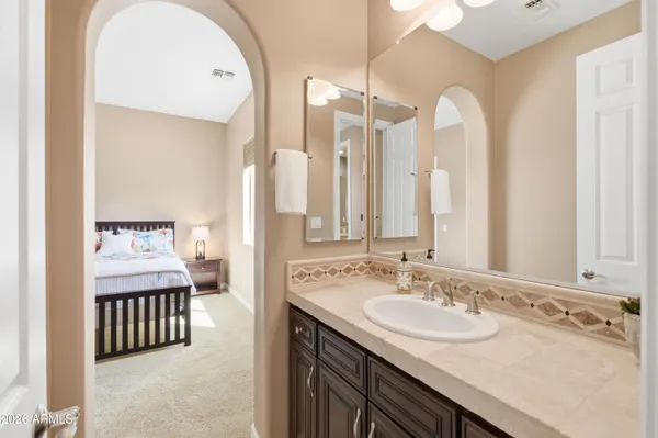 a view of a backyard with furniture and a patio