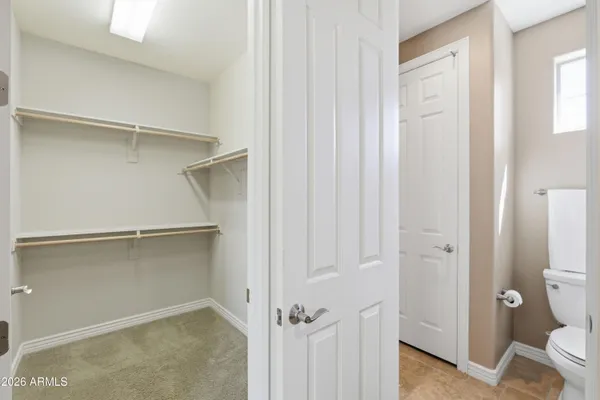 a view of a street with a building in the background