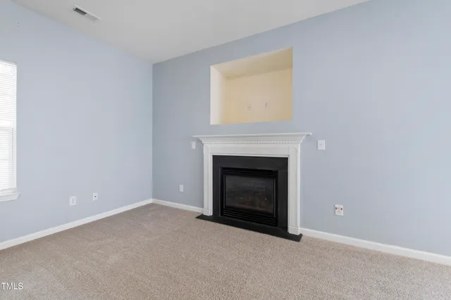 a room with a fireplace