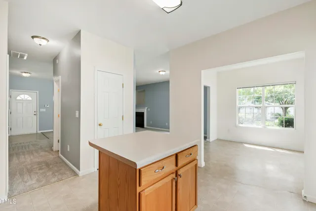 a view of kitchen and front door