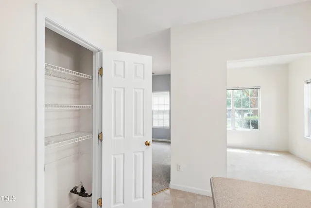 a bathroom with a tub and shower
