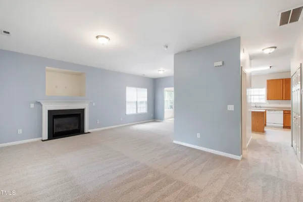 a view of a livingroom with a fireplace