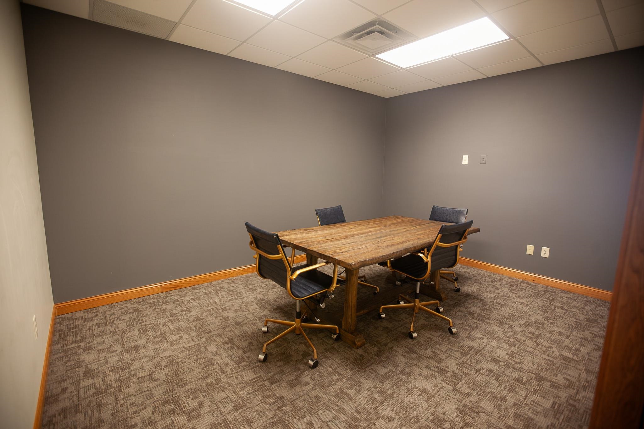 408 4th Street Moose Lake, MN 55767 - Photo 14 of 31 Office area with a paneled ceiling and carpet floors