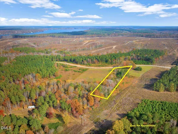 a view of a lake with a big yard