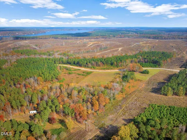 a view of a city with mountains in the background