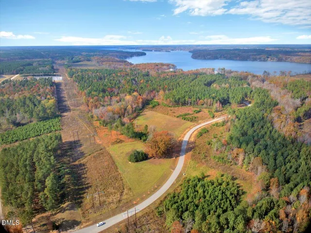 a view of a yard with an ocean view