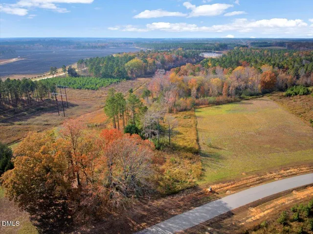a view of a lake with a yard