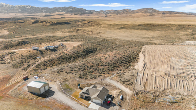 18573 South Marsh Valley Road Downey, ID 83234 - Photo 26 of 32 Aerial view of property and surrounding area with rural landscape