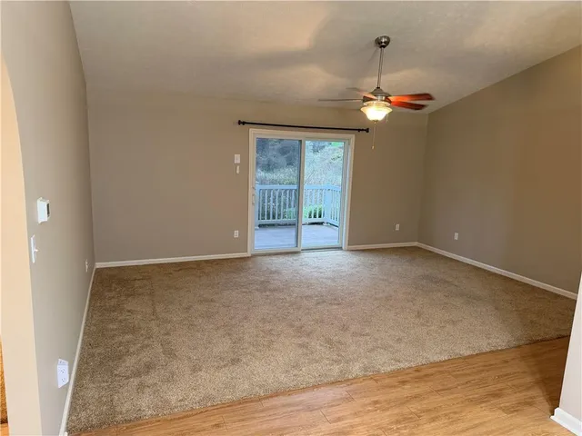 a view of an empty room with window