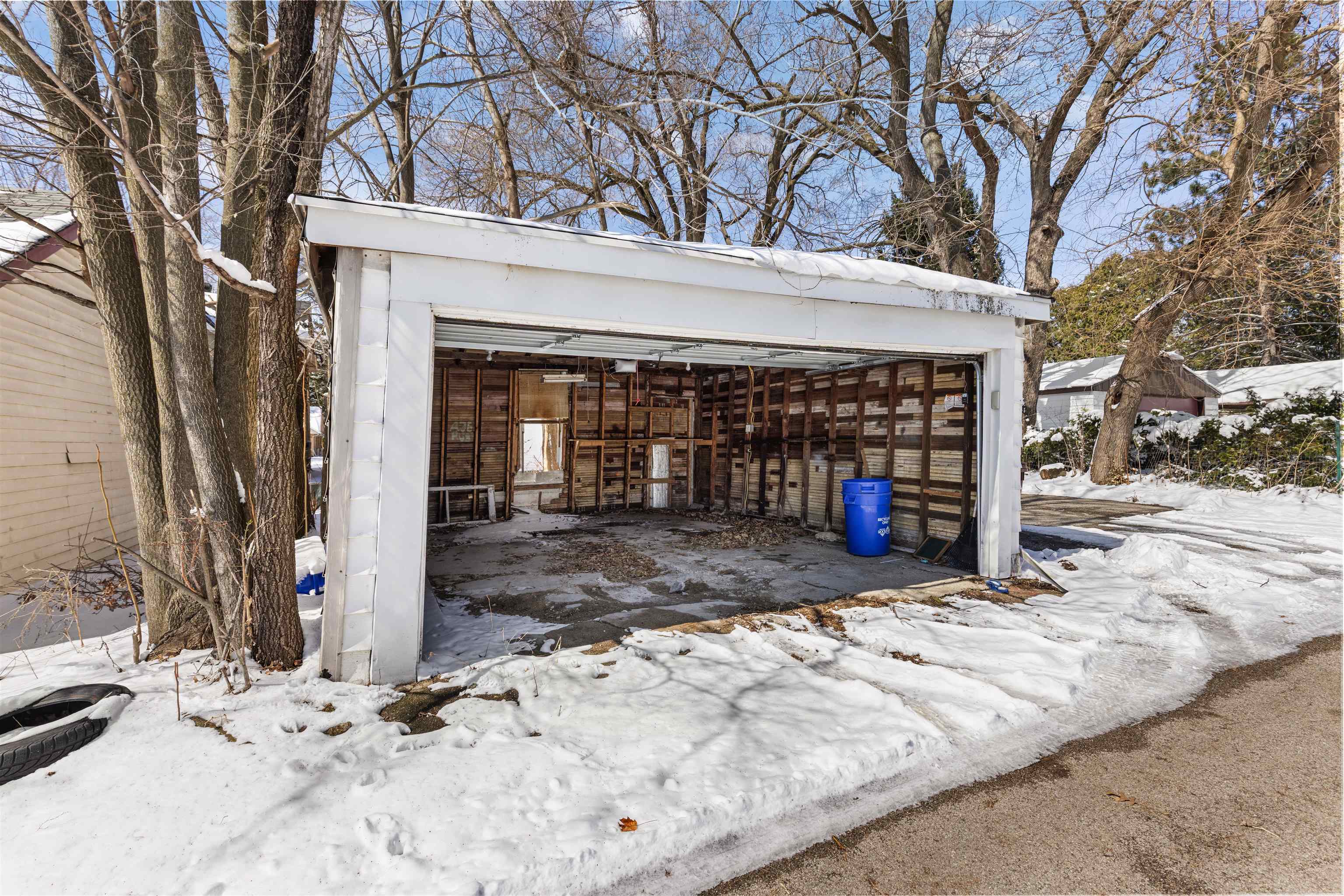 221 Rome Avenue Rockford, IL 61107 - Photo 3 of 26 a view of a building with a snow on the road