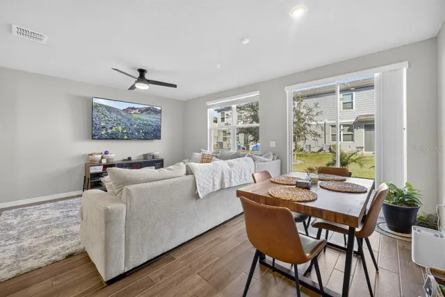 a bedroom with a bed and a table in it