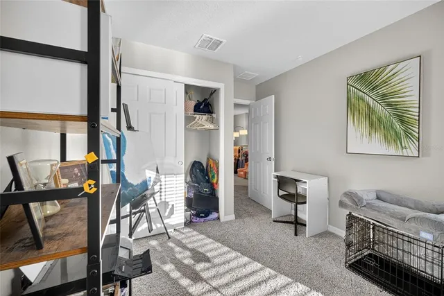 a view of a car parked in front of a house