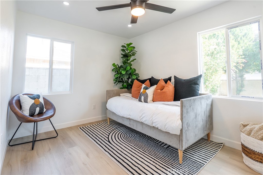 7516 San Juan Avenue Riverside, CA 92504 - Photo 15 of 43 a bedroom with a bed and a window