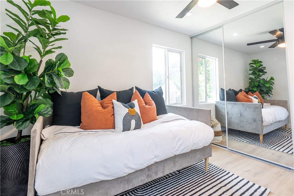 7516 San Juan Avenue Riverside, CA 92504 - Photo 16 of 43 a bedroom with a bed and a couch