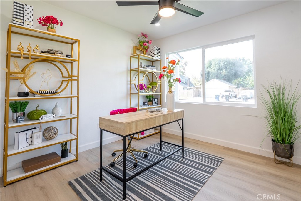 7516 San Juan Avenue Riverside, CA 92504 - Photo 17 of 43 a room that has a table and a chair