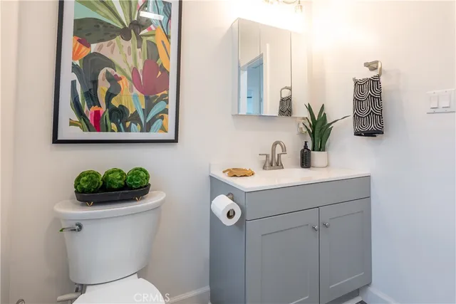 a view of a backyard with large trees