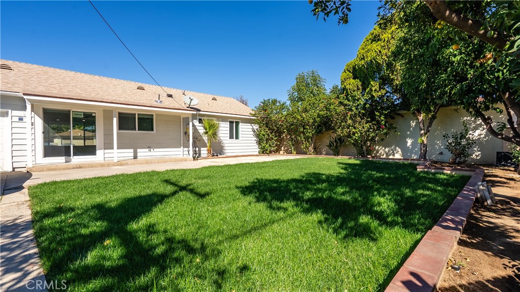 7516 San Juan Avenue Riverside, CA 92504 - Photo 28 of 43 a view of a house with backyard porch and sitting area