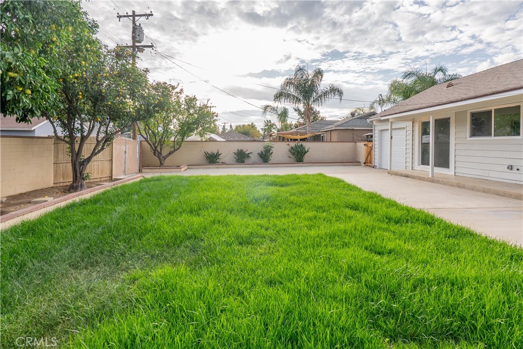 7516 San Juan Avenue Riverside, CA 92504 - Photo 31 of 43 a view of backyard with a garden and plants