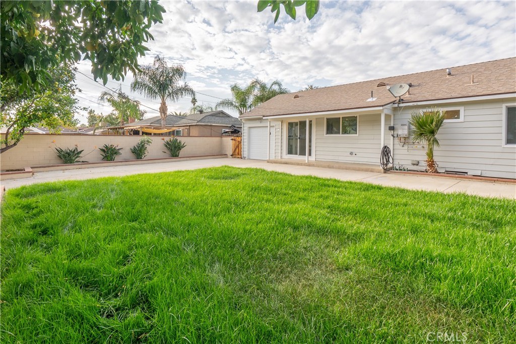 7516 San Juan Avenue Riverside, CA 92504 - Photo 32 of 43 a front view of house with yard and outdoor seating
