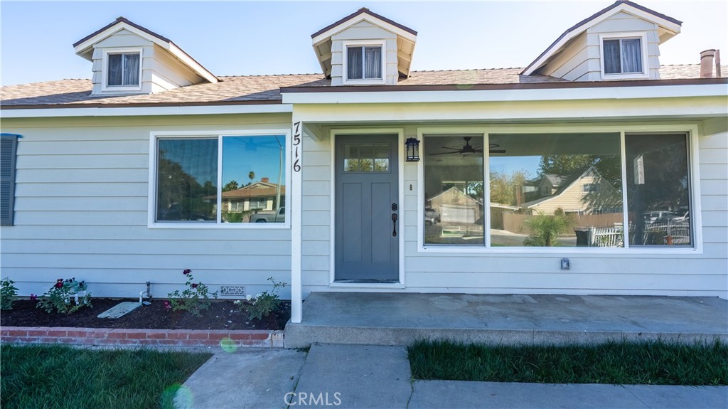 7516 San Juan Avenue Riverside, CA 92504 - Photo 33 of 43 a front view of a house with garden