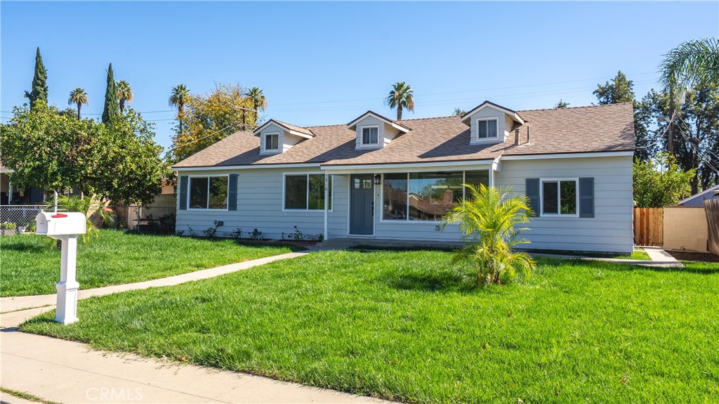 7516 San Juan Avenue Riverside, CA 92504 - Photo 36 of 43 a front view of a house with a yard