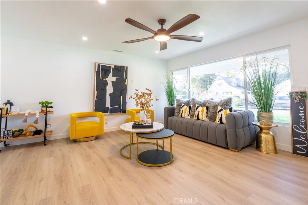 7516 San Juan Avenue Riverside, CA 92504 - Photo 5 of 43 a living room with furniture and a large window