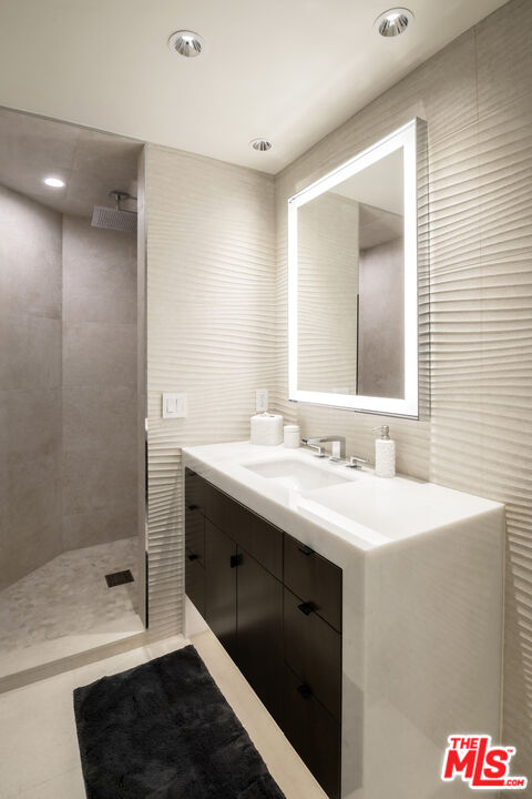 335 Wrigley Road Avalon, CA 90704 - Photo 35 of 69 a bathroom with a sink and a mirror