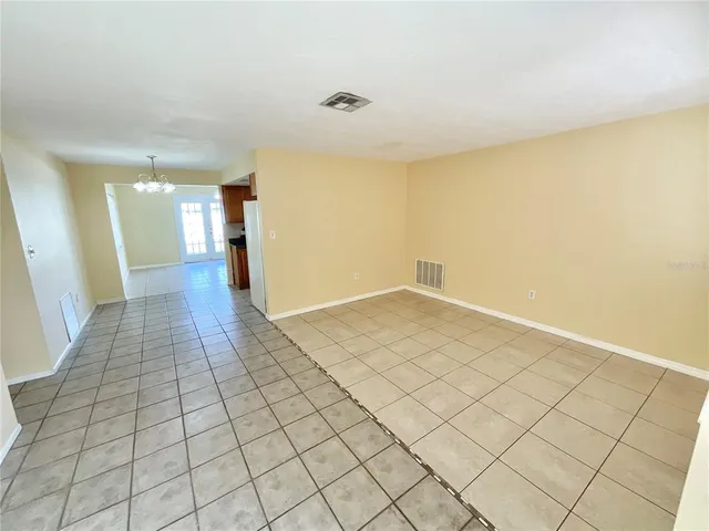 a view of an empty room and window