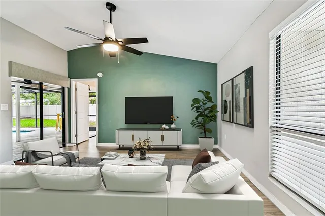 a view of kitchen with cabinets table and chairs
