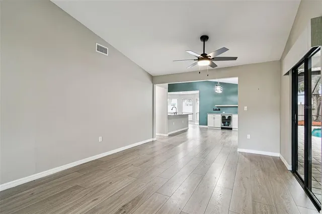a kitchen with stainless steel appliances granite countertop a sink and stove top oven