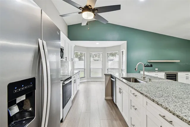 a bathroom with a shower and toilet