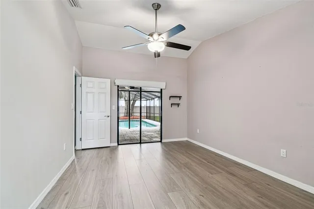 a bathroom with a sink a light fixture and a mirror