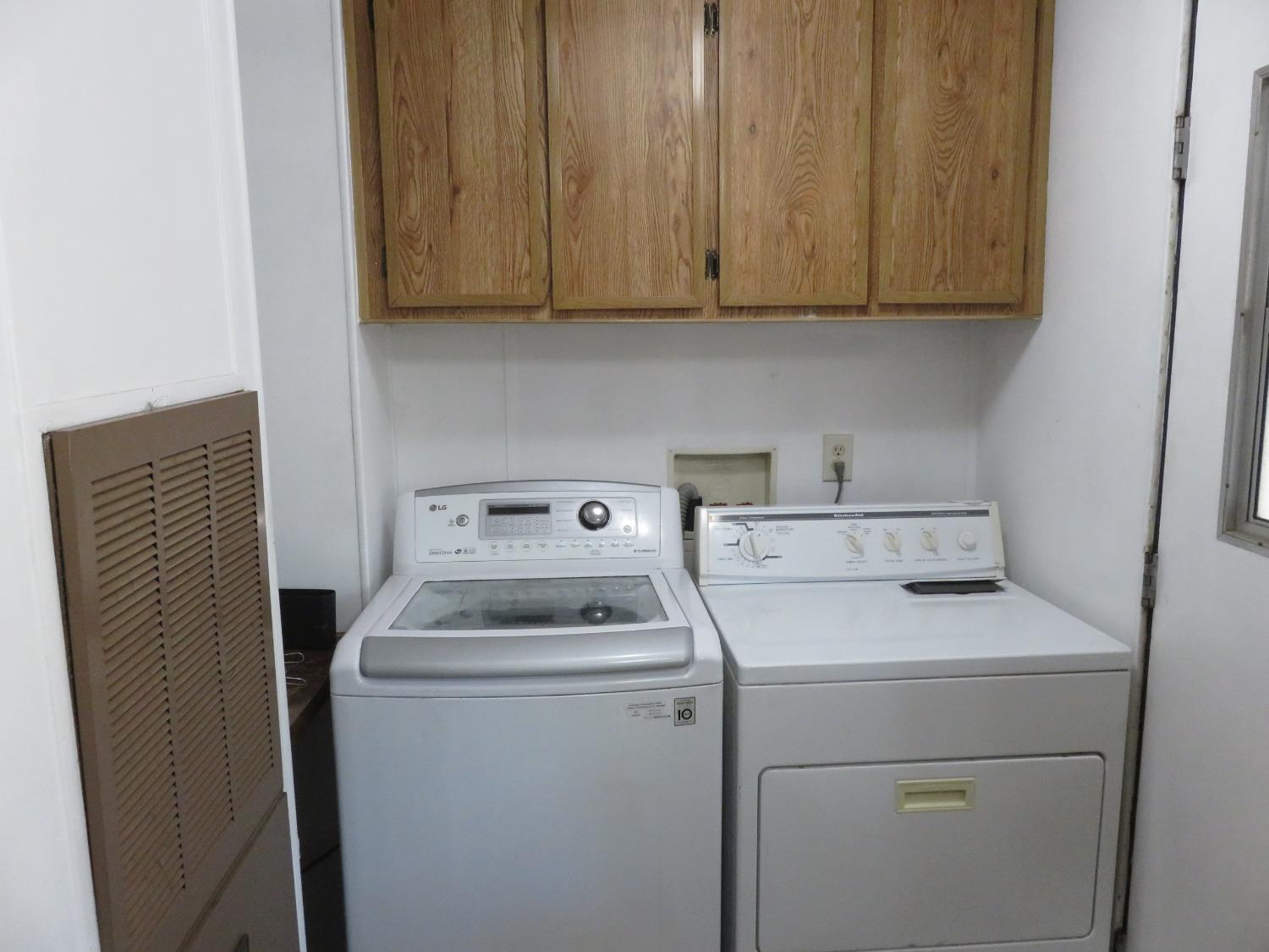 4426 Bald Mountain Road West Point, CA 95255 - Photo 26 of 45 a utility room with dryer and washer