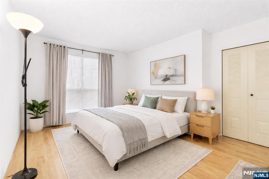 696 Pepperidge Road Mahwah, NJ 07430 - Photo 9 of 14 a bedroom with a bed and a window