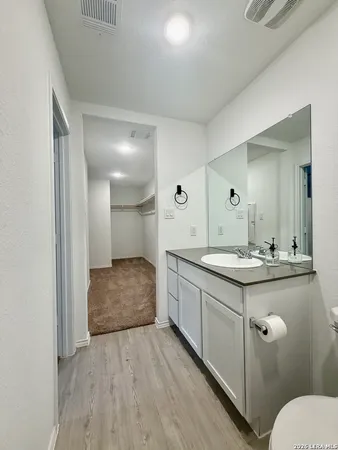 a view of an empty room and fire place