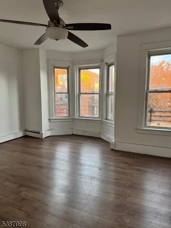 a view of livingroom with hardwood floor and window