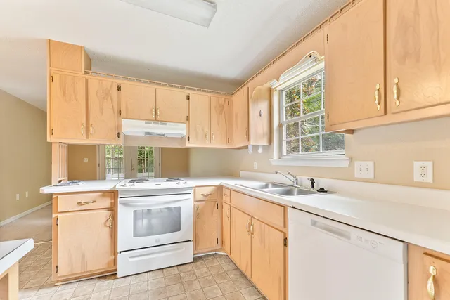 wooden floor with white walls