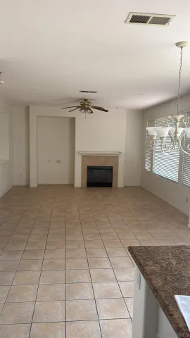 a white toilet sitting next to a window