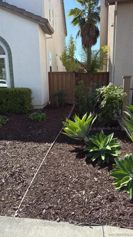 a view of a backyard of a house