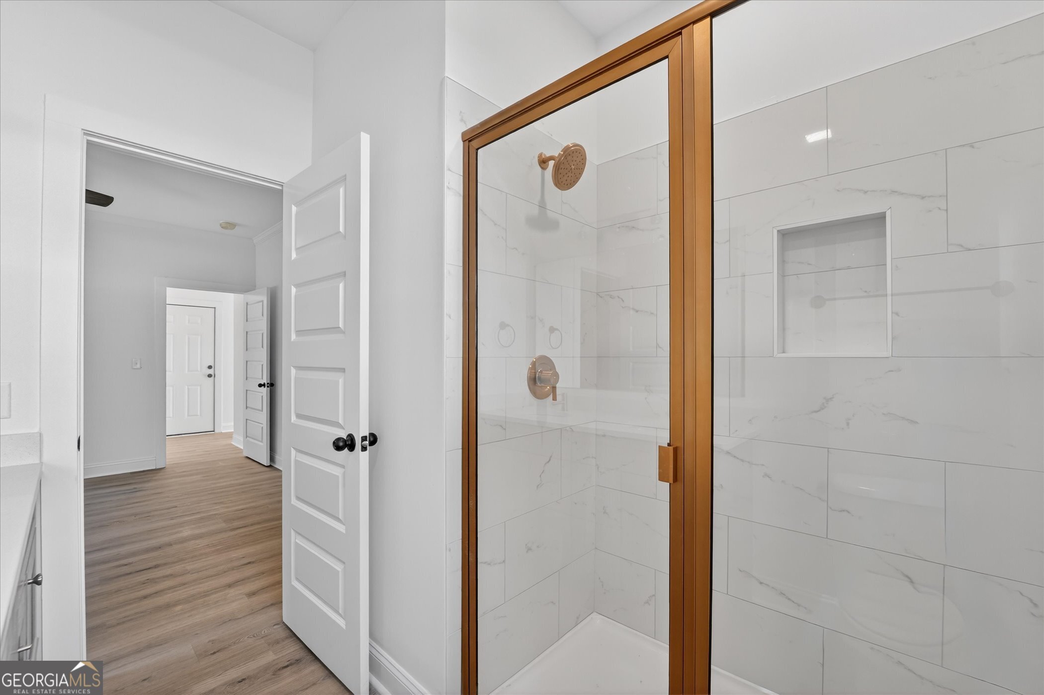 1058 Cottage Way Darien, GA 31305 - Photo 12 of 20 a bathroom with a shower and a glass door