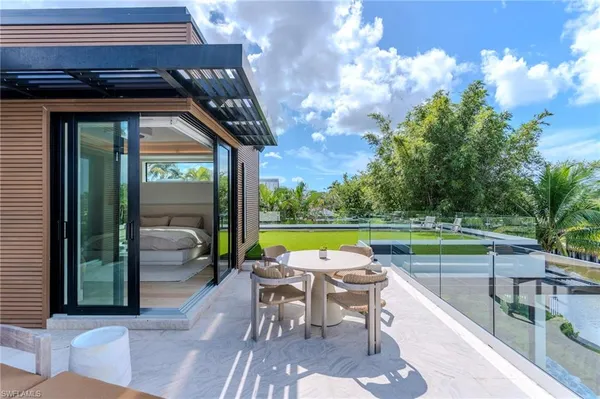 a view of a swimming pool with a patio