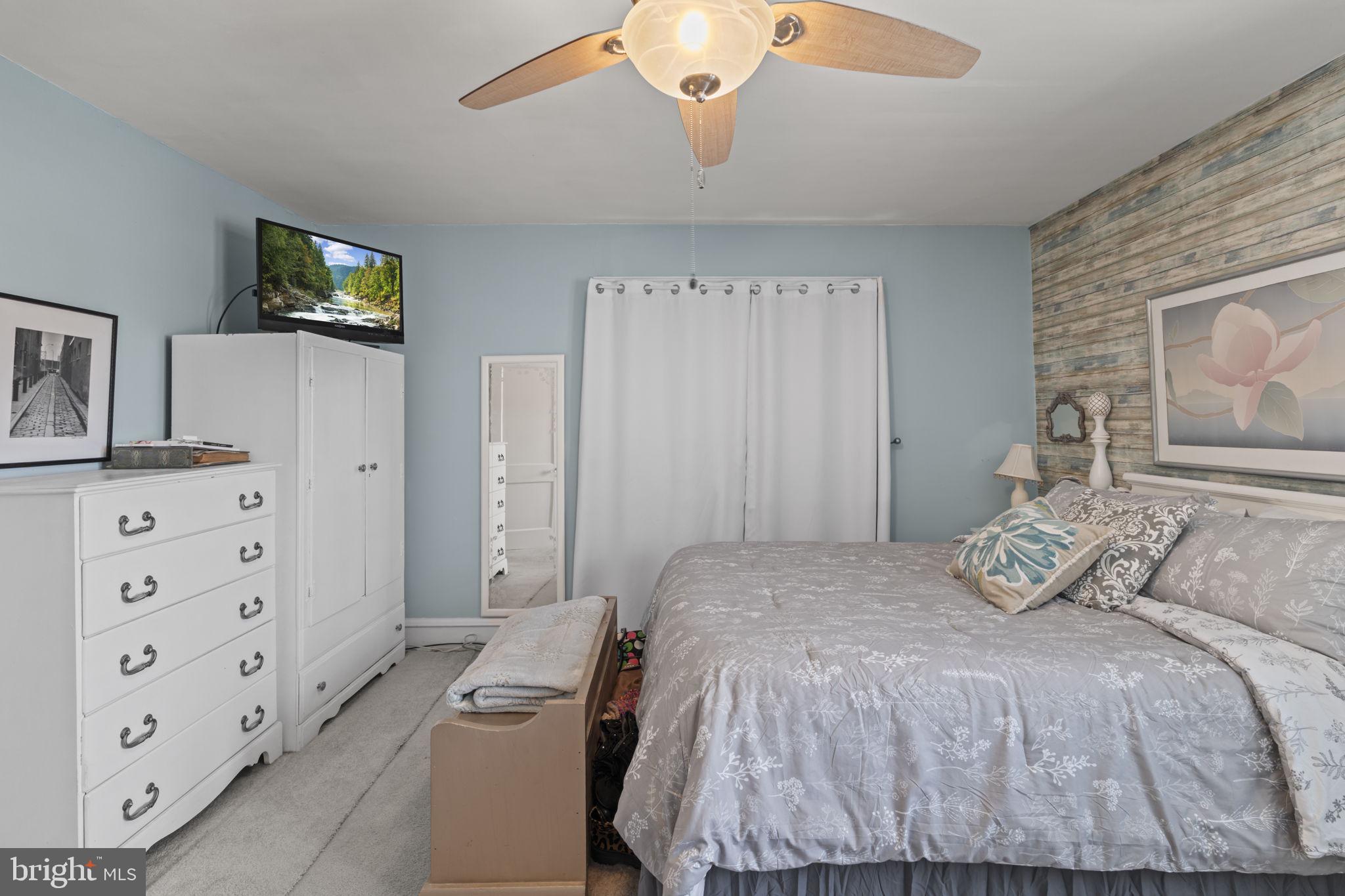 330 Burmont Road Drexel Hill, PA 19026 - Photo 23 of 35 a bedroom with a bed and furniture