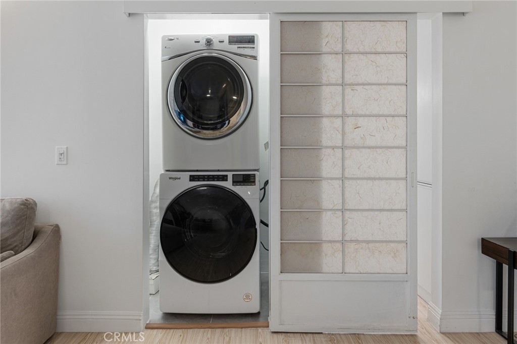 8701 Delgany Avenue, Unit 110 Playa del Rey, CA 90293 - Photo 14 of 22 a utility room with dryer and washer