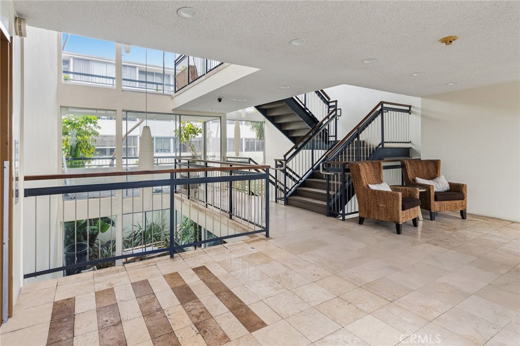 8701 Delgany Avenue, Unit 110 Playa del Rey, CA 90293 - Photo 21 of 22 a view of entryway and hall with wooden floor