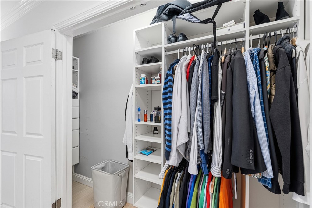 8701 Delgany Avenue, Unit 110 Playa del Rey, CA 90293 - Photo 10 of 22 a view of walk in closet with clothes and shoes
