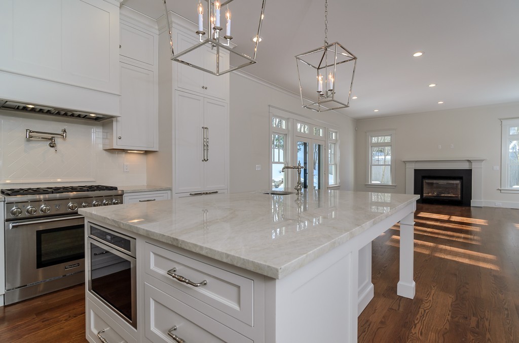 27 Priscilla Road Wellesley, MA 02481 - Photo 3 of 17 a kitchen with stainless steel appliances granite countertop a stove and a sink